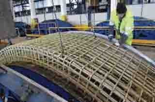 FRP ground support rock bolts and ribbed rebar mesh assembling  for the reinforcement  of an underground mining tunnel.